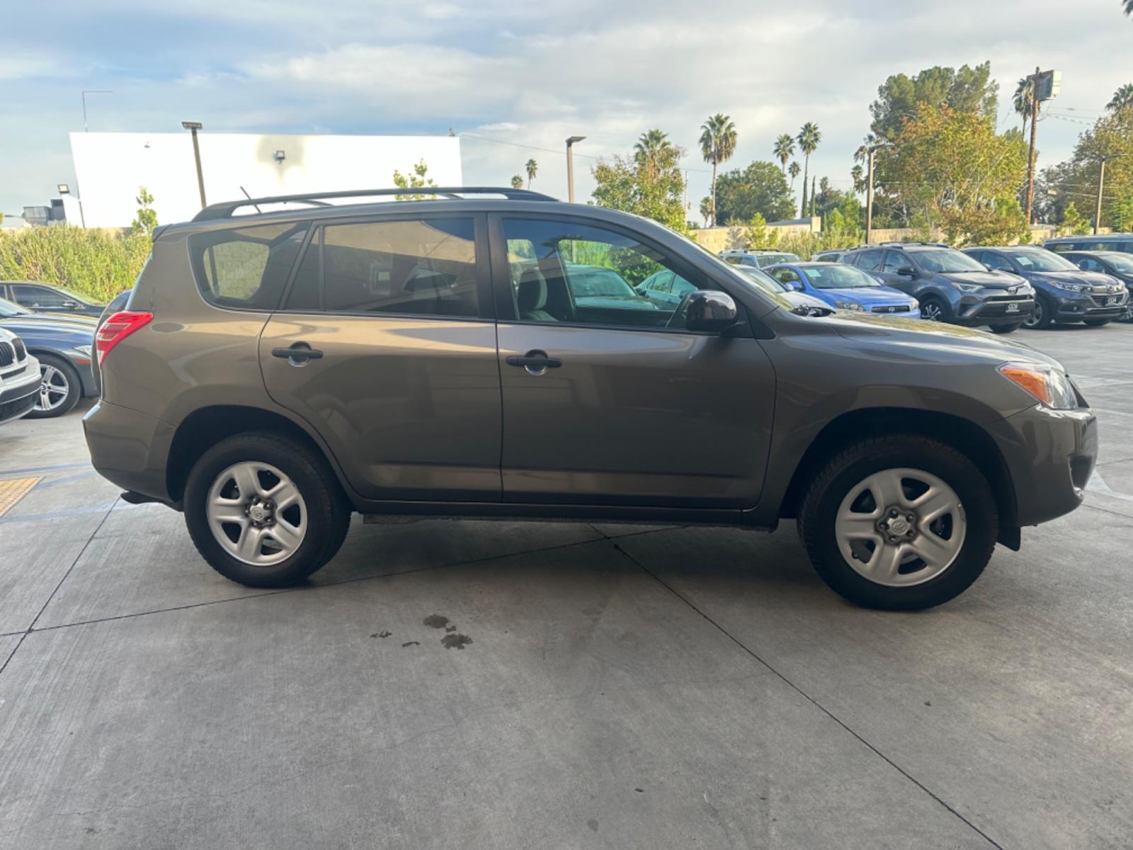 2012 Gray Toyota RAV4 Base I4 2WD with 3rd Row (2T3KF4DVXCW) with an 2.4L L4 DOHC 16V engine, 4-Speed Automatic transmission, located at 30 S. Berkeley Avenue, Pasadena, CA, 91107, (626) 248-7567, 34.145447, -118.109398 - Crown City Motors is a used “Buy Here Pay Here” car dealer in Pasadena CA. “Buy Here Pay Here” financing, means that when you purchase your vehicle from our dealership, that you make the payments to the dealership as well. We do not need the banks approval to get you approved for a used auto - Photo #5
